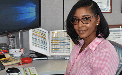 Tyra from Enterprise Solutions at Her Desk
